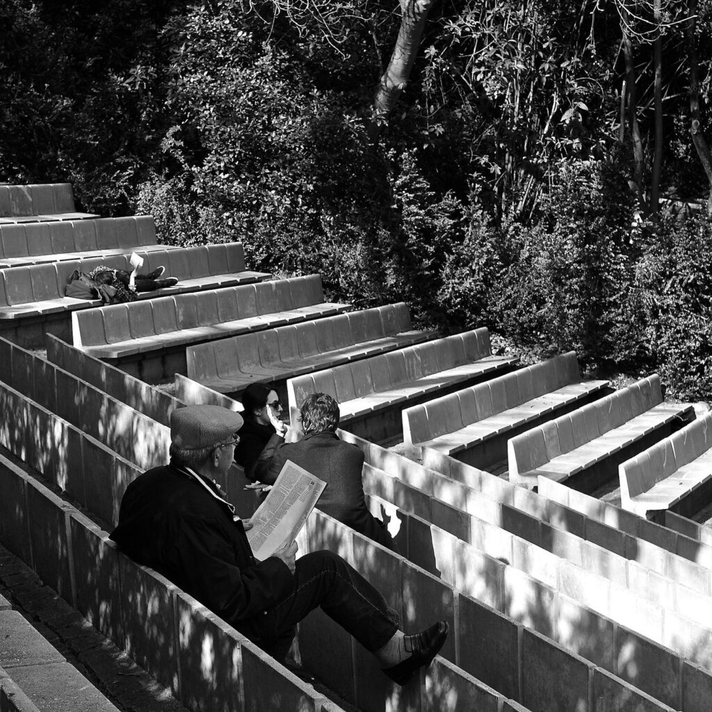 two people talking over coffee